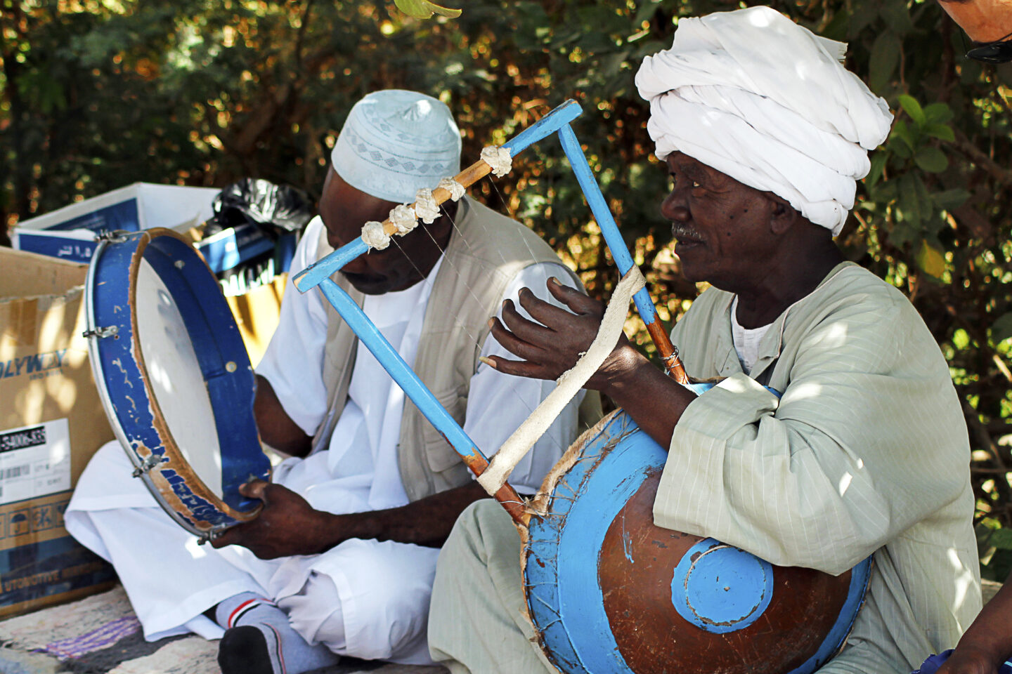 The Living Legacy of Nubia: Egypt’s Ancient Southern Kingdom Nubian culture today. Men playing music on traditional instruments.